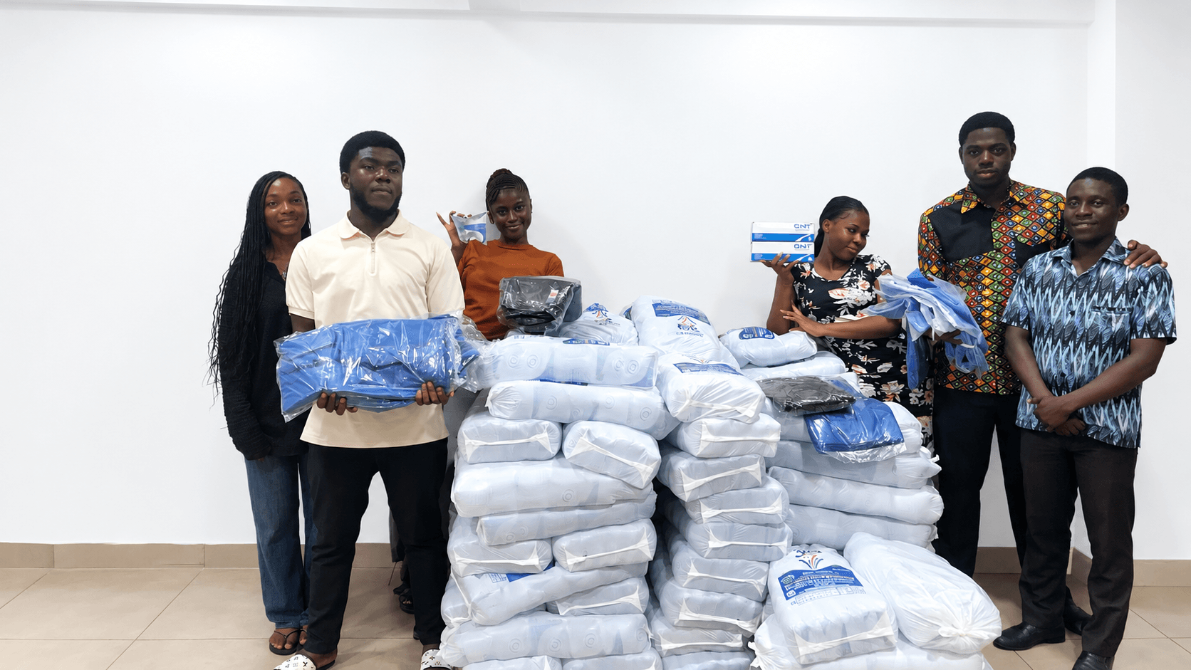 JCR executives of Hostel C distribute 150 bags of water and essential items to support Level 100 residents of Nii Amon Kotei Hostel